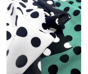 Tissu stretch imprimé pois
