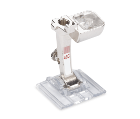 Pied Décoratif pour Nervures avec Semelle Transparente N°46C pour machine électronique - Bernina : Précision et Créativité