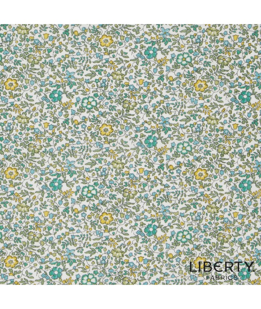 Tissu coton Liberty motif floral champêtre, semis moutarde et vert sur fond crème