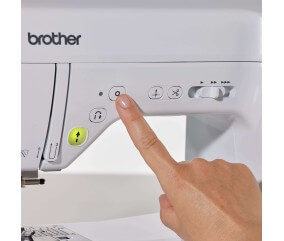 Machine à coudre et à broder Brother Innov-is F580 - touches coupe-fil et marche arrêt