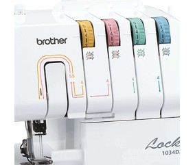 Surjeteuse Brother 1034DX - molettes de tension codées couleur pour l'enfilage