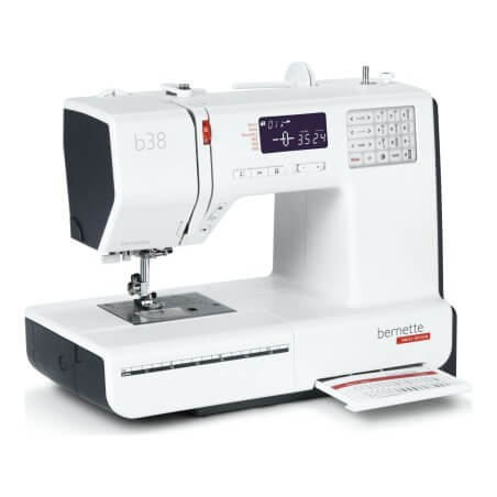 Machine à coudre Bernette B38 - tiroir du livret des points intégré au plateau