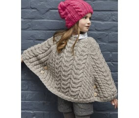 Poncho fille Abbie en laine naturel chiné, torsades et point fantaisie - Patron tricot Phildar - modèle fini
