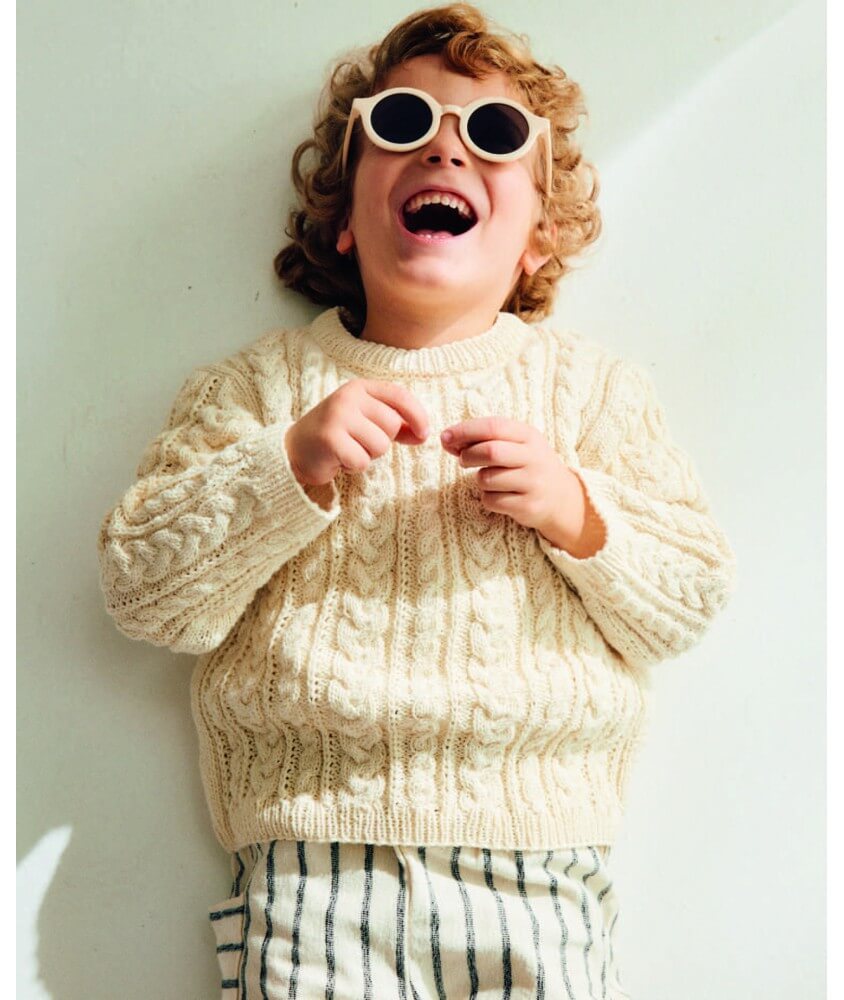 Pull enfant Didier en coton écru, point fantaisie et torsades - Patron tricot Phildar - modèle fini