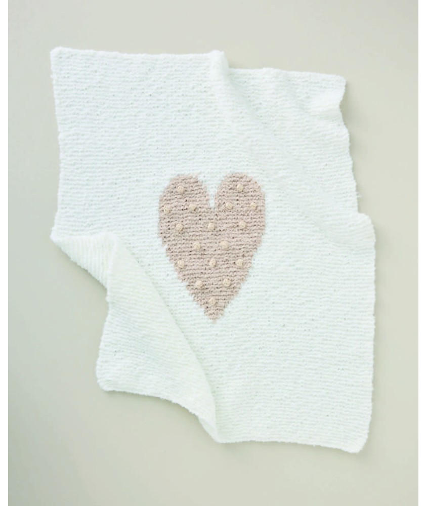 Couverture bébé Landy tricotée en bouclette blanche avec un coeur beige au centre - Patron tricot Phildar